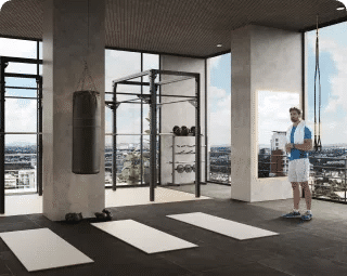 Gimnasio equipado con pesas y barras.